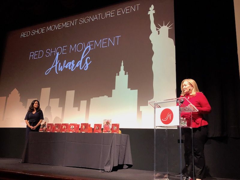 Cynthia Hudson welcomes the Red Shoe Movement audience to Awards Ceremony