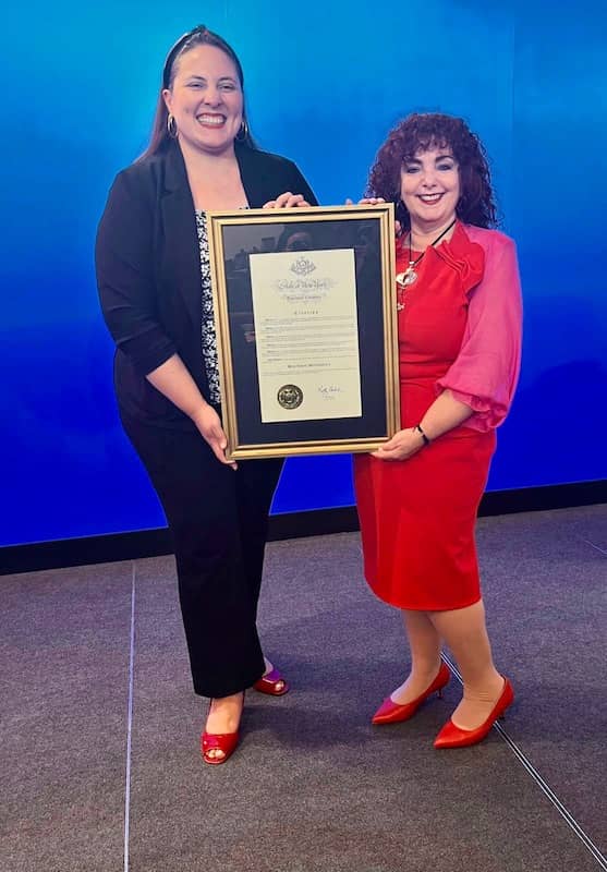 Julissa Gutierrez, Chief Diversity Officer, New York State brought a Special Citation conferred to the Red Shoe Movement by Governor Kathy Hochul.